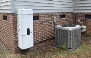 The Best Customers Make us the Best Simpsonville Plumber - tankless water heater on side of house in simpsonville